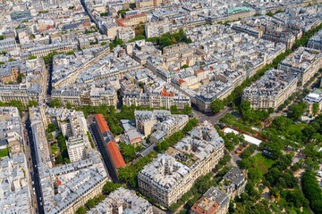 Stunning aerial view of Paris featuring its iconic architecture and tree-lined streets. This image embodies the city s charm, suitable for travel and urban planning publications.