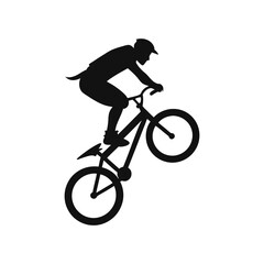 Fototapeta premium Mountain Biker Performing Wheelie Silhouette