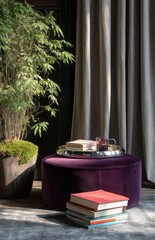 Purple pouf with tray and books in cozy living room