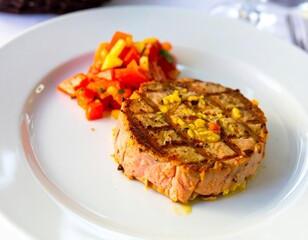 Blackened tuna steak with mango salsa and cilantro