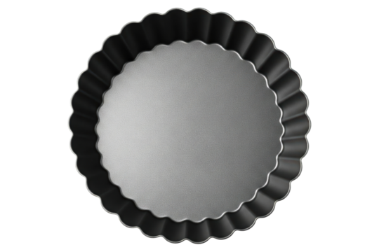 Black metal tart pan with fluted sides for baking pastries isolated on a transparent background