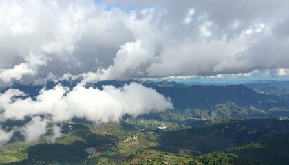 Mountainous landscape shrouded in clouds