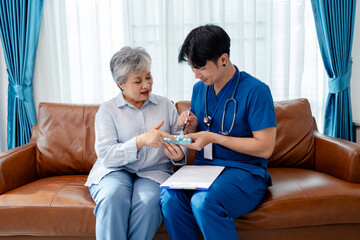 asian senior woman consult supplement medicine vitamin and drug instructed by physiotherapist. home...