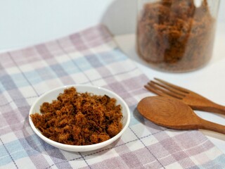 bowl of beef floss with wooden utensils