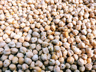 Close-Up of Dried White Chickpeas in a Metal Container
