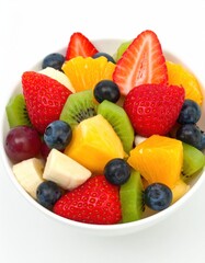 Obraz premium Colorful fruit salad in a bowl (2)