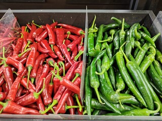 Top view of red and green fresh chilies highlight the rich texture and natural beauty of this healthy vegetable, ideal for culinary and agricultural themes
