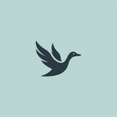 Flying duck logo in smooth and simple silhouette design.
