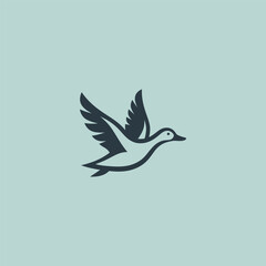 Flying duck logo in smooth and simple silhouette design.