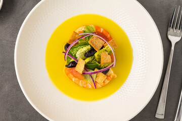 Shrimp on creamy corn soup, topped with tortilla strips, onion and avocado
