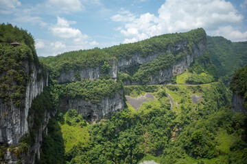 Lush Green Mountains with Winding Road