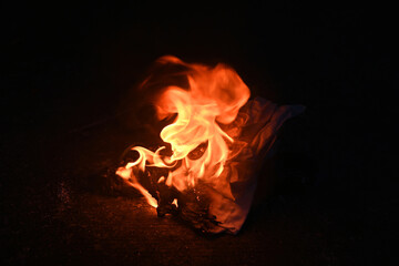 Burning fire flames on a black background