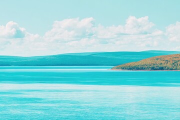 Tranquil lake vista with distant hills under a partly cloudy sky