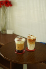 Closeup of Iced Caramel Macchiato at the coffee shop, Caramel Macchiato is a classic macchiato...