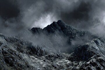 Dramatic mountain range under stormy sky