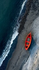 Red Boat on Black Sand Beach by the Black Sea in Iceland