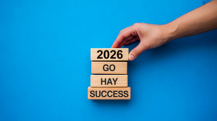 Wooden blocks with year and words year 2026 success