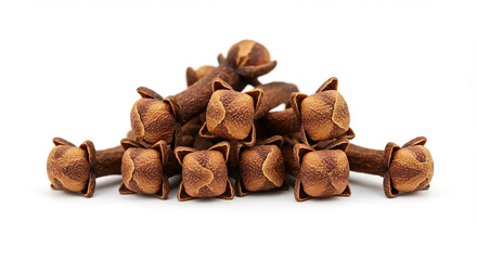 Obraz premium A detailed macro photograph of a pile of whole dried aromatic cloves spice isolated on a clean white background for culinary concepts.