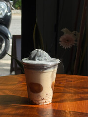 Closeup of Iced Caramel Macchiato at the coffee shop, Caramel Macchiato is a classic macchiato...
