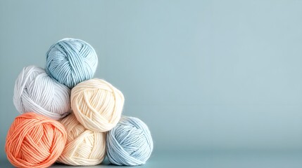Colorful Yarn Balls on Blue Background