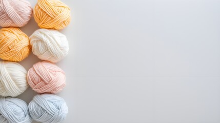"Colorful Yarn Balls on Minimalist White Background"