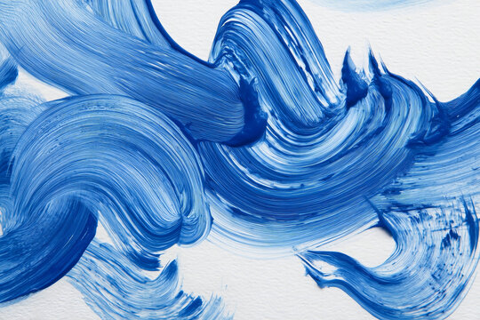 Abstract blue brush strokes on white canvas, creating a dynamic and textured artistic composition.