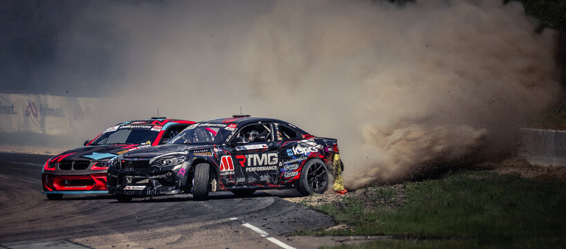 Two Stock Cars in a High-Stakes Race