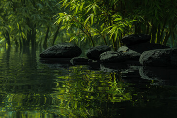 black rocks and bamboo on a water surface. The background features green plants in sunlight, creating a tranquil nature scene for a zen spa concept.