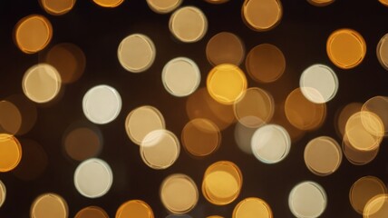 Abstract image of blurred, out-of-focus, circular bokeh lights in shades of gold and white against a dark background.