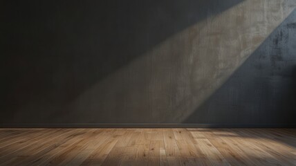 Interior view of a room featuring a dark wall illuminated by a diagonal beam of sunlight, with a wooden floor.