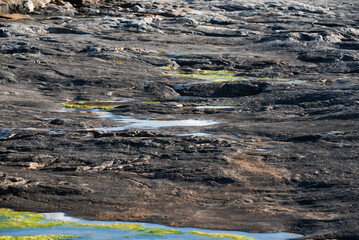 clear water in the rocks of the rocky ocean shore