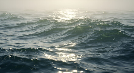 Ocean waves, sunlight reflecting on water surface
