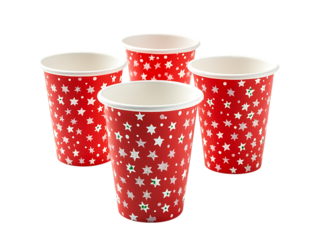Four festive red paper cups with white star pattern isolated on transparent background