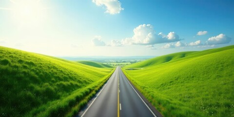 Asphalt ribbon unwinding through vibrant green hills under a bright sunny sky, promising adventures ahead on an open road journey