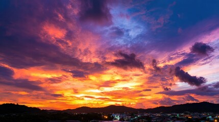 Sunrise over landscape horizon: Purple-orange cloud illumination for nature documentaries and environmental awareness content
