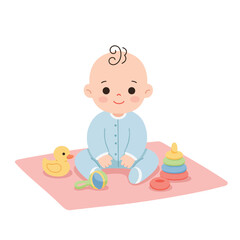 A baby in a blue jumpsuit sits on a pink blanket surrounded by toys, including a duck, rattle, and stacking rings.