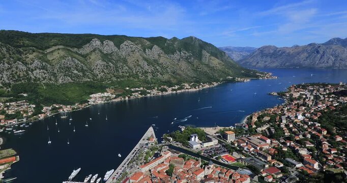 Panning right 4K motion of the city of Kotor, the old port of Kotor is surrounded by a fortification wall built during the Venetian period, Kotor is a UNESCO World Heritage, Kotor, Montenegro, Europe