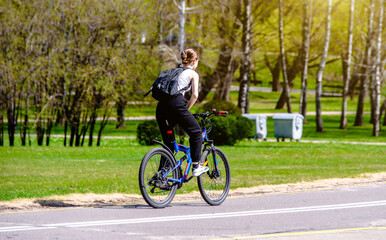 Cyclist ride on the bike path in the city Park

