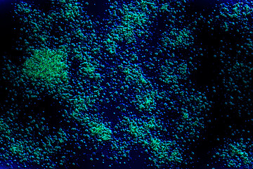 Surreal blue green drop substance matter,flying in outher digital space
