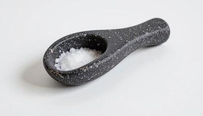 Obraz premium a high resolution, ultra sharp isolated bath salt scoop made from lava stone, placed on a pure white background with no shadow or minimal soft shadows only