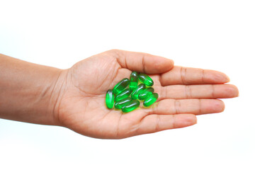 Healthy Lifestyle with Vitamin E Capsules in Hand – Isolated White Background.