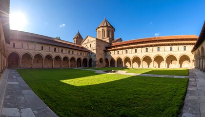 Fototapeta premium Architectural grandeur illuminates Svetitskhoveli Cathedral's central courtyard at Mtskheta
