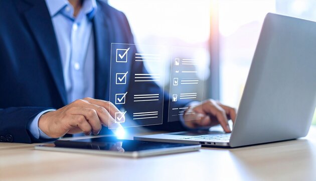 Confident businessman checks off tasks on digital interface while working on laptop in modern office