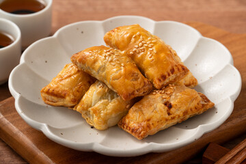 Delicious BBQ pork puff pastry dim sum food.