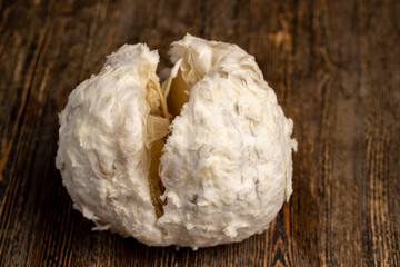 sweet and peeled citrus, delicious fresh citrus on a wooden board, closeup