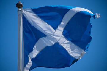 Scottish flag on a flagpole flapping in the wind, Saltire, Saint Andrew's Cross
