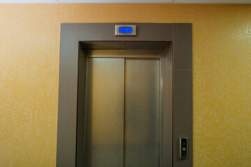 The doors of the elevator which is on the first floor