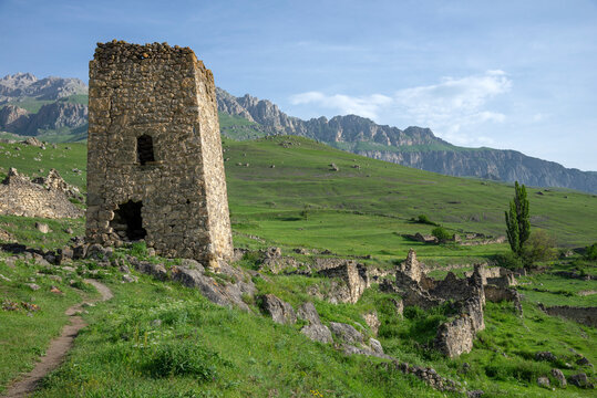 A semi-ruined tower on the ruins of an old fortress, Tsmiti. North Ossetia-Alania, Russia