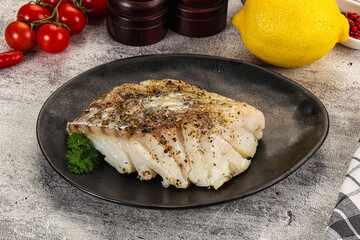 Baked cod fish fillet with spices