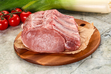 Raw pork loin cut with bone
